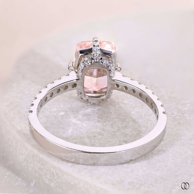 Unique elongated cushion cut diamond ring with pave band design
