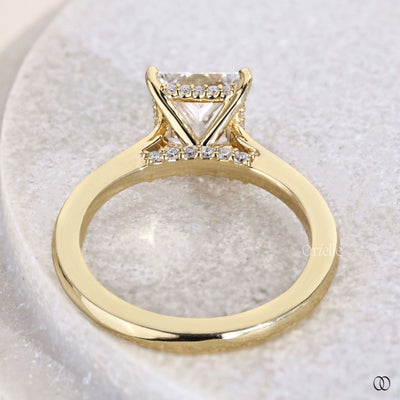 Princess cut engagement ring with hidden accent stone
