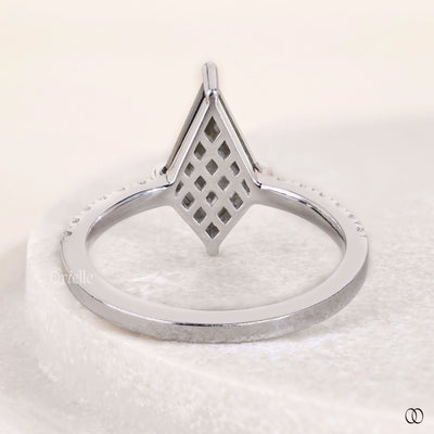 salt and pepper ring pear cut halo setting
