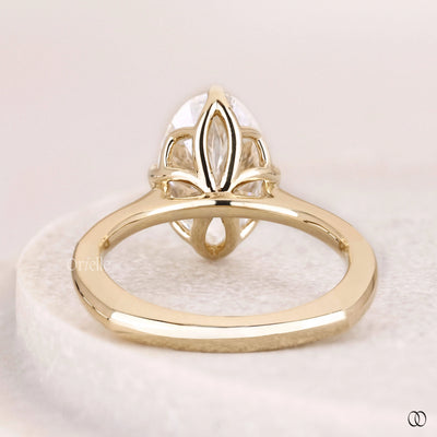 Handmade oval cut diamond engagement ring with cathedral setting
