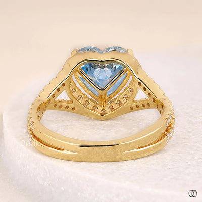 vivid blue diamond ring heart shaped setting

