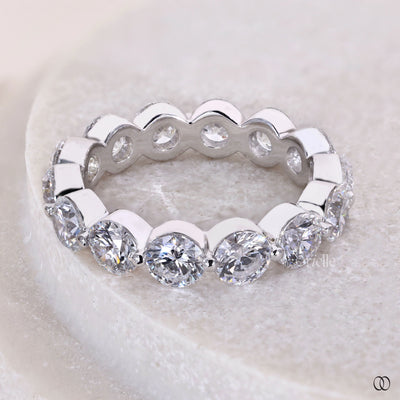 prong set round diamond full eternity band in white gold
