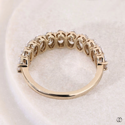 gold wedding band oval diamond design
