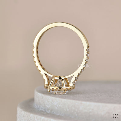 Handmade ring crafted as round brilliant halo engagement ring
