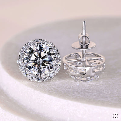 handmade round diamond halo earrings in white gold

