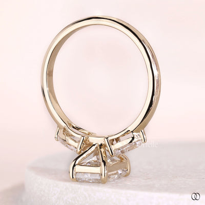three stone diamond ring pear cut engagement ring
