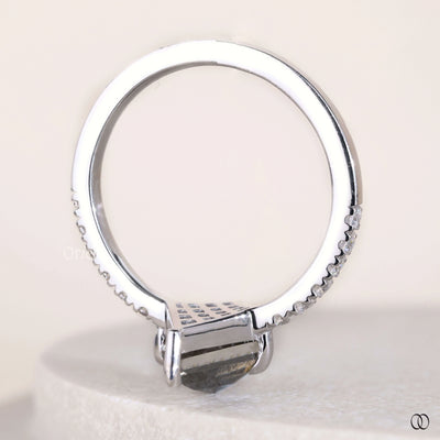 white gold ring pear cut moissanite design
