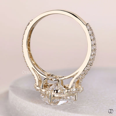Lab grown heart shaped diamond ring with split shank halo band

