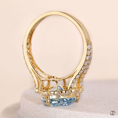 cathedral setting engagement ring blue diamond
