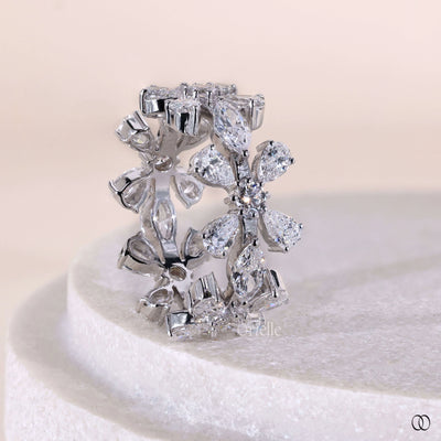elegant white gold statement band with mixed diamond shapes

