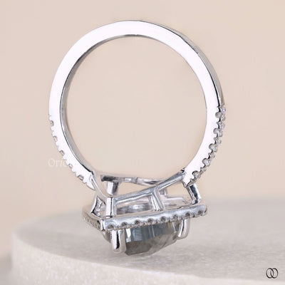 white gold ring pear cut moissanite design
