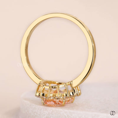 unique setting ring pinkish orange diamond
