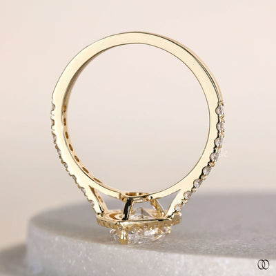 Handmade ring crafted as a unique pear engagement ring

