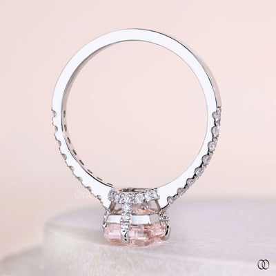White gold elongated cushion cut diamond ring with pave band
