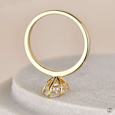Tulip setting supporting marquise diamond ring
