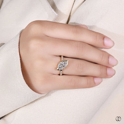 marquise cut diamond ring channel pave gold ring
