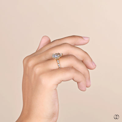 unique design ring yellow gold pear diamond

