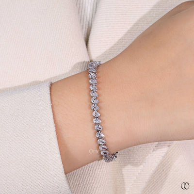 handmade pear diamond tennis bracelet white gold
