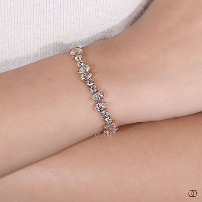 designer diamond bracelet pear round cut gold
