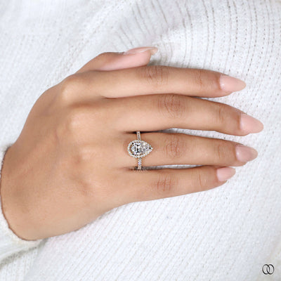 Antique engagement ring style pear cut halo diamond ring
