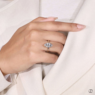 Yellow gold marquise engagement diamond ring with claw prongs
