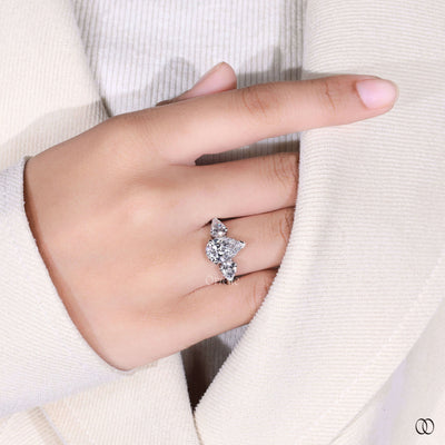 three stone diamond ring pear cut engagement ring
