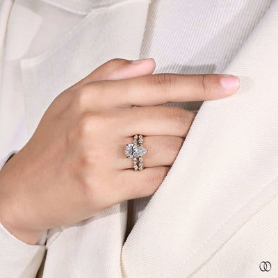 pear cut engagement ring marquise diamond band
