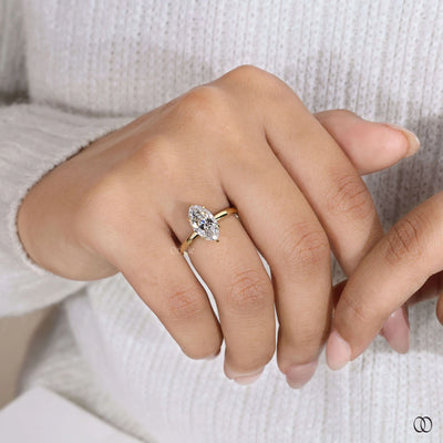 Handmade ring crafted as marquise engagement ring
