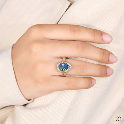 halo diamond engagement ring vivid blue diamond
