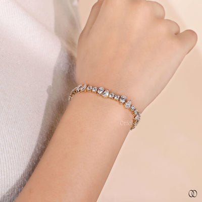 diamond tennis bracelet pear round cut yellow gold
