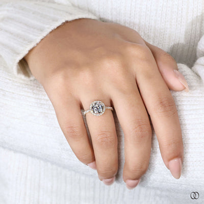 Pave diamond ring paired with round brilliant engagement ring

