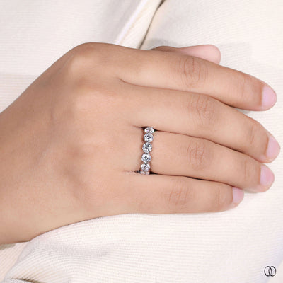 classic round diamond prong set eternity wedding band
