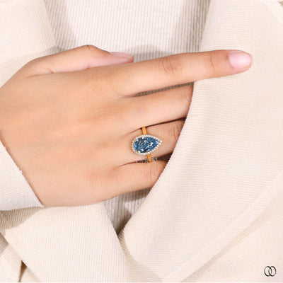 pear cut engagement ring cathedral halo ring
