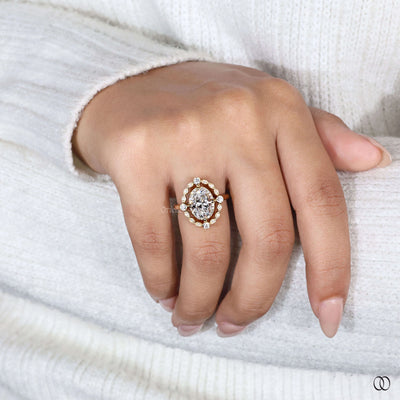 Round bezel setting ring paired with oval cut diamond
