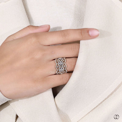 filigree wedding band prong set moissanite ring
