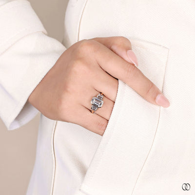 emerald cut diamond ring 5 stone gold setting
