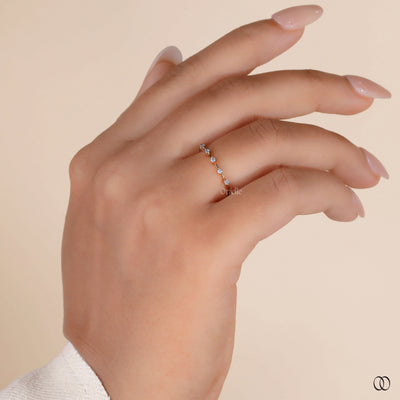 Designer wedding band with elegant diamond accents
