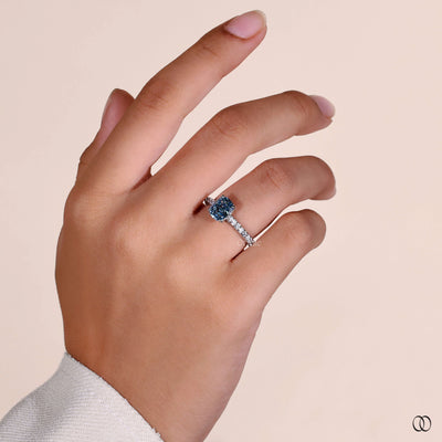unique setting ring cushion cut blue diamond
