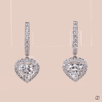 Pavé set huggie hoop earrings with brilliant diamond details
