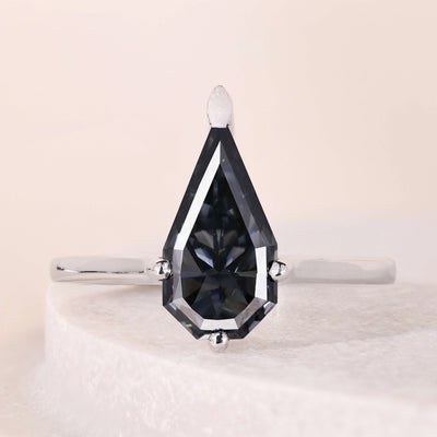 gray diamond ring shield cut engagement ring
