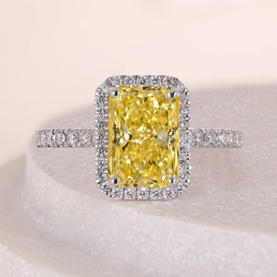 yellow diamond ring radiant cut halo style ring
