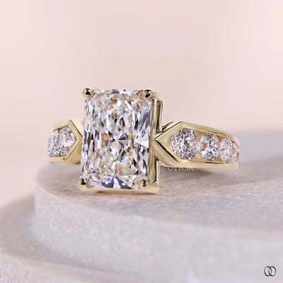 Yellow gold engagement ring with sparkling diamond accents
