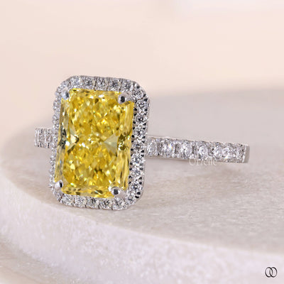 pave setting radiant cut yellow diamond ring
