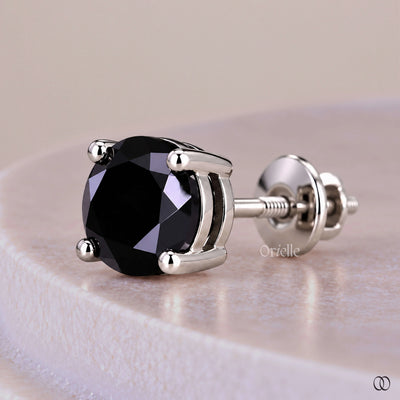 Solitaire stud earrings with a classic single stone setting
