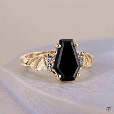 bat wing ring yellow gold
