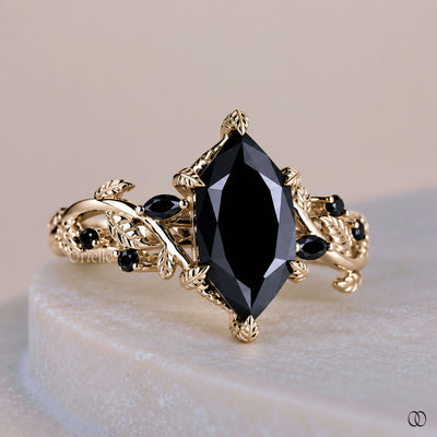 black moissanite ring yellow gold
