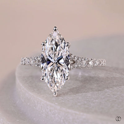 pave ring marquise cut engagement ring

