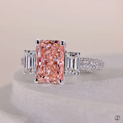 Trilogy engagement ring with three sparkling diamond stones
