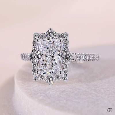 Cathedral setting engagement ring with elegant raised design
