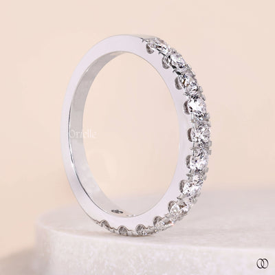 shared prong style round diamond gold ring
